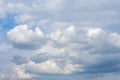 White fluffy clouds against a blue sky