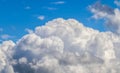 Beautiful white fluffy clouds in a deep blue summer sky Royalty Free Stock Photo