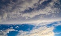 Beautiful white fluffy clouds in a deep blue summer sky Royalty Free Stock Photo