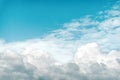 Beautiful white fluffy cumulus clouds on blue sky Royalty Free Stock Photo