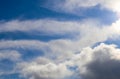 Beautiful white fluffy cumulus clouds in a deep blue summer sky Royalty Free Stock Photo