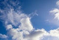 Beautiful white fluffy cumulus clouds in a deep blue summer sky Royalty Free Stock Photo