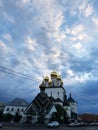 Beautiful white green Church with Golden domes