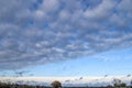 Beautiful white and grey clouds and cloud formations on a deep blue sky Royalty Free Stock Photo