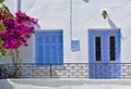 White house with blue window and door Royalty Free Stock Photo