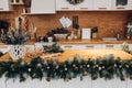 Beautiful white kitchen decorated for Christmas. Christmas holidays Royalty Free Stock Photo