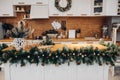 Beautiful white kitchen decorated for Christmas. Christmas holidays Royalty Free Stock Photo