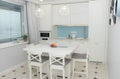 Beautiful white kitchen. Modern style. The decor of the apartment. Solid wood kitchen. Modern kitchen filling. Russia, Saint