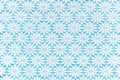 Beautiful white lace on light blue background. Royalty Free Stock Photo