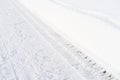 Beautiful white landscape, Swiss Alps, wide alpine winter road cleared, large snowdrifts on the side, snowfall in in the city,