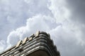 Beautiful white large cumulus scenic clouds over a residential apartment high-rise building Royalty Free Stock Photo