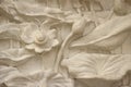 Beautiful white lotus stucco patterned on the boundary wall. Vintage white wall bas-relief stucco in plaster, depicts Lotus Royalty Free Stock Photo