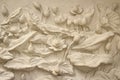 Beautiful white lotus stucco patterned on the boundary wall. Vintage white wall bas-relief stucco in plaster, depicts Lotus Royalty Free Stock Photo