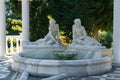 Beautiful white marble fountain with figures from Greek mythology in Aivazovsky landscape park in Partenit
