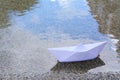 Beautiful white paper boat on water outdoors, space for text Royalty Free Stock Photo
