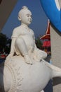 Beautiful white plaster poster statue in Thai temple, Phetchaburi province, Thailand