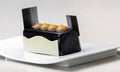 Beautiful white platter with chocolate food item for presentation