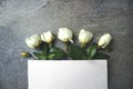 Beautiful white roses and elegant blank paper stationery photo mockup. High resolution spring presentation for art design.