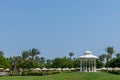 Beautiful white rotunda on a green meadow