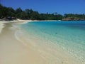 Beautiful white sand and clear water in the beach.