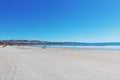 Beautiful white sandy beach with clear blue sky