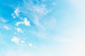 Beautiful white small soft fluffy clouds on a blue sky background, sky with sun glare Royalty Free Stock Photo