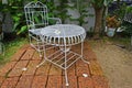 Beautiful white table and chair on rock floor Royalty Free Stock Photo