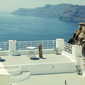 beautiful white terrace overlooking sea in Oia, Santorini, Cyclades, Greece Royalty Free Stock Photo
