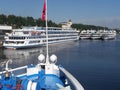 Beautiful white tourist motor ships moored at the pier of the river station in the city of Yaroslavl on the Volga river