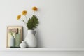 white wall with flower vase on Shelf Royalty Free Stock Photo