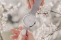 Beautiful white watch in woman hands