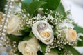 Beautiful white wedding bouquets in basket backgraound bouquet flowers rose / wedding rings Royalty Free Stock Photo