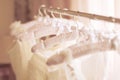 Beautiful white wedding dresses made of silk on hangers Royalty Free Stock Photo