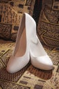 Beautiful white wedding shoes for the bride Royalty Free Stock Photo