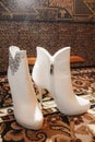 Beautiful white wedding shoes for the bride Royalty Free Stock Photo