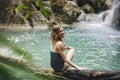 Beautiful white woman at a Erawan waterfall Royalty Free Stock Photo