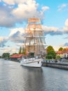 Beautiful white yacht - famous symbol of Klaipeda. Restaurant on sailing boat, Dane river a