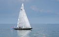 Beautiful white yacht sailing at IJsselmeer bay. Netherlands