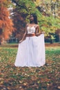 Beautiful wiccan girl dancing in the forest Royalty Free Stock Photo