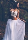 Beautiful wiccan girl dancing in the mystical forest Royalty Free Stock Photo