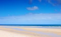 Beautiful wide open beach with blue skies in Summer