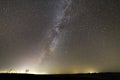 Beautiful wide panorama, rural landscape at night. Boundless dark sky with myriads of white sparkling stars, Milky Way galaxy and