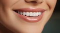 Beautiful wide smile of young fresh woman with great healthy white teeth whitening. Close up Dental image symbolizes oral care