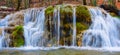 Beautiful wide waterfall on a mountain river