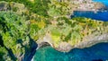 Beautiful wild coast scenery view with Bridal Veil Falls (Veu da noiva) at Ponta do Poiso in Madeira Island. Aerial view