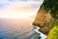 Beautiful wild coast scenery view with Bridal Veil Falls (Veu da noiva) at Ponta do Poiso in Madeira Island. Near Porto Moniz,