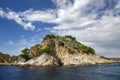 Beautiful wild rocks with coniferous trees on Mediterranean coast Royalty Free Stock Photo