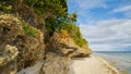 Beautiful wild tropical beach near Anda with granite rocks. Bohol Island. Philippines. Royalty Free Stock Photo