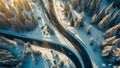 Beautiful winding road shot from above, winter adventure Royalty Free Stock Photo