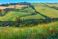 Beautiful winding rural road with cypresses in Tuscany, Italy, Europe